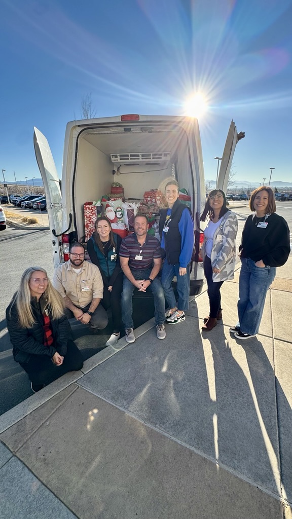 Carson Tahoe Health team preparing Adopt-A-Senior Carson Tahoe holiday gifts for seniors.