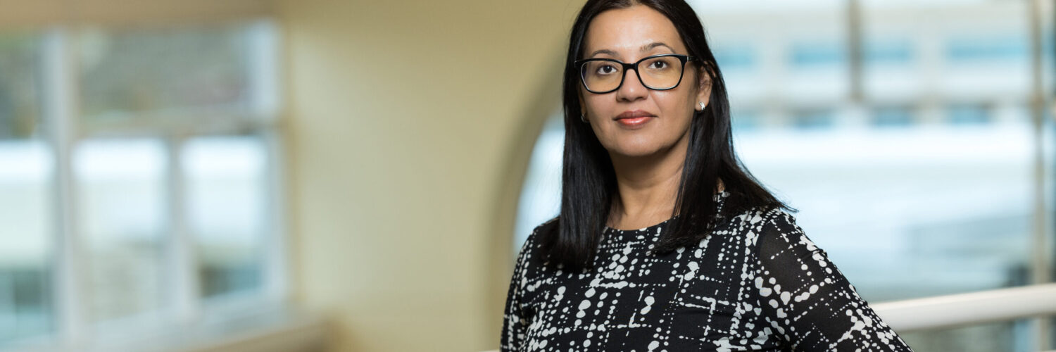 Portrait of Saadia Akhtar standing indoors at Carson Tahoe Health.