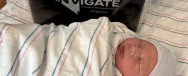 Newborn baby at Carson Tahoe Health with 529 college savings gift for families