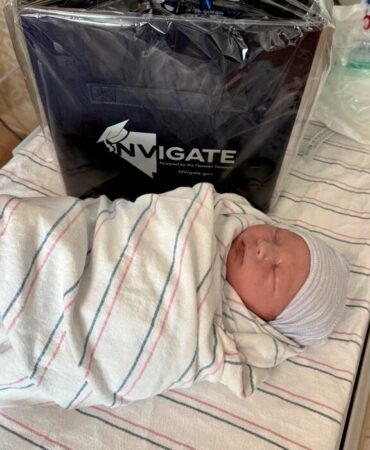 Newborn baby at Carson Tahoe Health with 529 college savings gift for families
