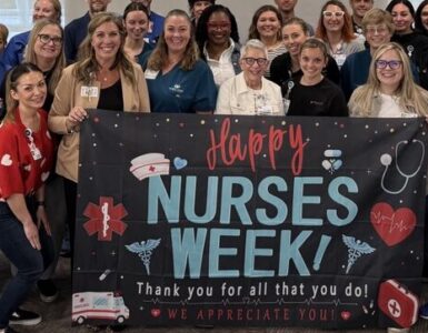 Carson Tahoe Health nurses celebrating National Nurses Week holding a thank-you banner