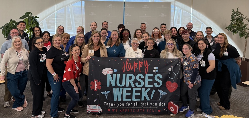 Carson Tahoe Health nurses celebrating National Nurses Week holding a thank-you banner