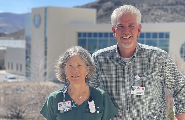 Carson Tahoe Health physical therapists Wendy and Jonathan standing together outside the hospital in Carson City