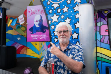 Michael McDonald of The Doobie Brothers points to a newly dedicated vinyl of Dave Mason on Carson Tahoe Health's SOUND IDEAS Vehicle of Change as their Champion of Creativity during the Dave Mason Legacy Dedication and Benefit Concert.