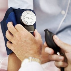 Doctor Checking for High Blood Pressure